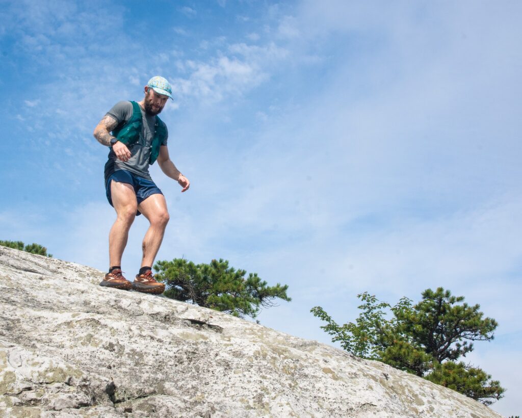 A runner descends a steep, rocky section of trail during the Shawangunk Ridge Trail Run. (RunWild Photo)